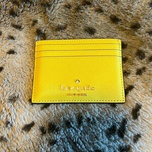 Kate spade card holder yellow great condition